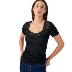 Koszulka damska Damart Thermolactyl. Czarne koszulki damskie DAMART, bez wzorów, ze skóry, bez kołnierzyka, bez ramiączek. Za 183.50 zł.