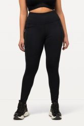 Damskie Legginsy sportowe szybkoschnące bardzo elastyczne. Czarne legginsy damskie Ulla Popken, plus size, bez wzorów, z elastanu. Za 239.99 zł.
