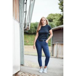 Damskie spodnie jeździeckie z pełnym lejem Catago Rihanna. Niebieskie spodnie sportowe damskie CATAGO, s, bez wzorów, z podwyższonym stanem, do jazdy konnej. Za 510.20 zł.