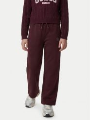 Guess Spodnie dresowe J6YB15 K3935 Bordowy Regular Fit. Czerwone spodnie dresowe dziewczęce Guess, z aplikacjami, z bawełny. Za 154.99 zł.