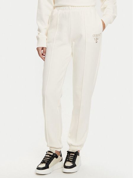 Guess Spodnie dresowe V5RB13 KC3D2 Écru Regular Fit. Spodnie dresowe damskie Guess, xs, z aplikacjami, z bawełny. Za 179.99 zł.
