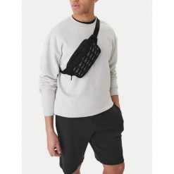 Nerka Reebok. Czarne nerki i saszetki damskie Reebok, bez wzorów. Za 49.99 zł.