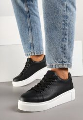Czarne Skórzane Sneakersy na Grubej Podeszwie z Perforacją i Aplikacją Neowenia. Czarne obuwie sportowe damskie Born2be, z jeansu, bez zapięcia. Za 139.99 zł.