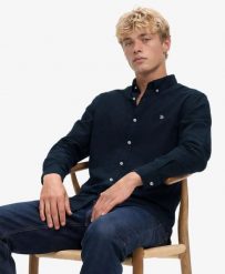 Superdry Klasyczna koszula Oxford z długim rękawem z bawełny organicznej –. Niebieskie koszule damskie Superdry, xl, bez wzorów, z bawełny, klasyczne, bez kołnierzyka, bez ramiączek. Za 282.20 zł.