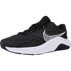 Tenisówki Nike Model Legend Essential 3 Wome Kolor Czarny. Czarne obuwie sportowe damskie Nike, bez wzorów, z gumy, bez zapięcia. Za 519.00 zł.