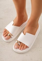 Białe Klapki Japonki Ozdobione Aplikacją na Palcu Noevianna. Białe klapki damskie Renee, z aplikacjami, z jeansu, bez obcasa, na płaskiej podeszwie, bez zapięcia. Za 79.99 zł.