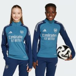 Koszulka treningowa Arsenal Tiro 25 Competition. Niebieskie koszulki damskie Adidas, bez wzorów, z dresówki, bez kołnierzyka, bez ramiączek. Za 279.00 zł.