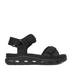 Sandały Rieker. Czarne sandały damskie Rieker, bez wzorów, bez obcasa, na płaskiej podeszwie, bez zapięcia. Za 349.99 zł.