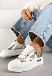 Złote Trampki na Grubej Podeszwie z Cyrkoniową Naszywką Penirea. Żółte obuwie sportowe damskie Renee, bez zapięcia. Za 69.99 zł.