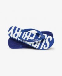 Superdry Klapki Core Logo z gumy, lekkie i wygodne – Regal Blue/Optic. Niebieskie klapki damskie Superdry, bez wzorów, z gumy, bez obcasa, bez zapięcia. Za 134.40 zł.