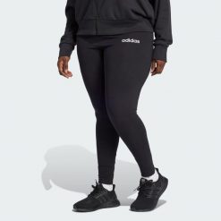 Legginsy Essentials Linear Cotton (Plus Size). Białe legginsy damskie Adidas, plus size, bez wzorów, z bawełny. W wyprzedaży za 69.50 zł.
