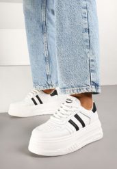 Biało-Czarne Sneakersy na Grubej Podeszwie z Perforacją i Paskami Fonistia. Białe obuwie sportowe damskie Born2be, z jeansu, bez zapięcia. Za 84.99 zł.