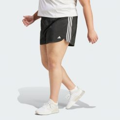 Szorty Pacer Training 3-Stripes Woven High-Rise (Plus Size). Białe obuwie sportowe damskie Adidas, z materiału, bez zapięcia, na fitness i siłownię. W wyprzedaży za 127.20 zł.