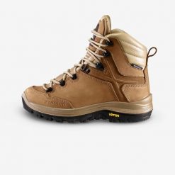 Buty trekkingowe damskie MT500 Vibram skóra wodoodporne. Brązowe obuwie trekkingowe damskie FORCLAZ, z kauczuku, przed kolano, bez zapięcia. Za 599.99 zł.