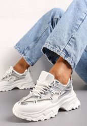 Biało-Srebrne Sneakersy na Grubej Podeszwie z Paskiem z Cyrkoniami Novallie. Białe obuwie sportowe damskie Born2be, z dresówki, bez zapięcia. Za 109.99 zł.