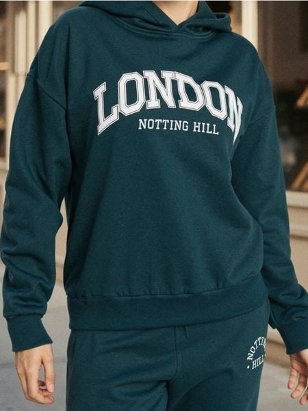 Bluza z napisem - zielony. Zielone bluzy damskie Sinsay, l, bez wzorów, bez kaptura. Za 39.99 zł.