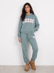 Spodnie jogger z bawełną - turkusowy. Niebieskie bluzy damskie Sinsay, l, bez wzorów, z bawełny. Za 39.99 zł.