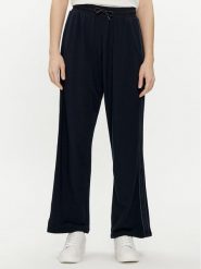 Tommy Hilfiger Spodnie dresowe UW0UW04771 Granatowy Relaxed Fit. Niebieskie spodnie dresowe damskie Tommy Hilfiger, m, bez wzorów, z dresówki. Za 269.99 zł.
