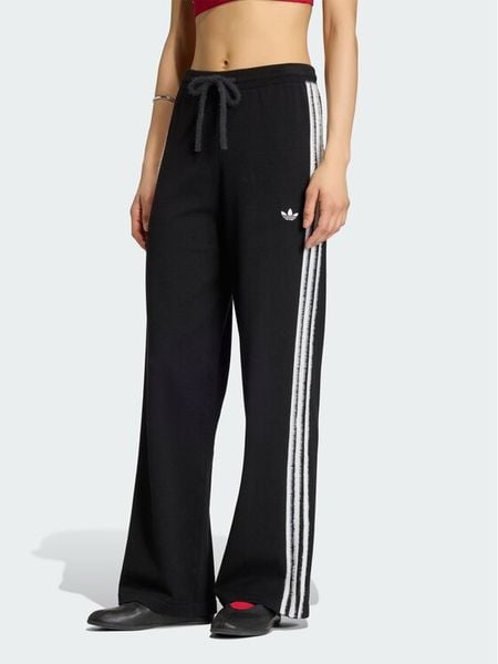 Adidas Spodnie dresowe Firebird KS9363 Czarny Regular Fit. Czarne spodnie dresowe damskie Adidas, s, bez wzorów, z dresówki. Za 250.99 zł.