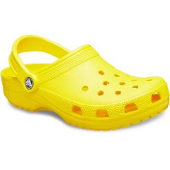 Japonki Crocs Classic, Dla obu płci. Żółte klapki damskie Crocs, bez wzorów, z materiału, bez obcasa, bez zapięcia. Za 297.00 zł.
