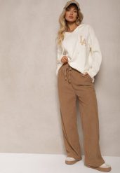 Ciemnobeżowe Spodnie o Szerokim Kroju High Waist z Wiązaniem w Pasie Ettianne. Brązowe spodnie materiałowe damskie Renee, bez wzorów, z jeansu. Za 39.99 zł.
