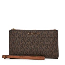 Portfel MICHAEL Michael Kors. Brązowe portfele damskie MICHAEL Michael Kors, bez wzorów. Za 679.99 zł.