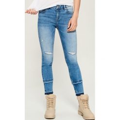Jeansy slim z frędzlami - Niebieski. Niebieskie jeansy damskie Sinsay. Za 99.99 zł.