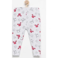Legginsy z nadrukiem all over - Jasny szar. Legginsy dziewczęce marki FOUGANZA. W wyprzedaży za 9.99 zł.