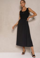 Czarna Rozkloszowana Sukienka z Wiskozy Ozdobiona Naszywką Ronlina. Czarne sukienki damskie Renee, z aplikacjami, z jeansu, eleganckie, bez ramiączek. W wyprzedaży za 135.99 zł.