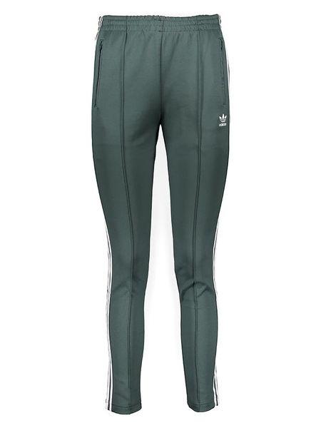 Adidas Spodnie dresowe w kolorze zielonym rozmiar: 34. Zielone spodnie dresowe damskie Adidas, bez wzorów, z dresówki. Za 83.22 zł.