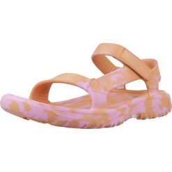 Klapki Teva Model W Hurricane Kolor Pomarańczowy. Brązowe klapki damskie Teva, bez wzorów, z gumy, bez obcasa, bez zapięcia. Za 229.50 zł.