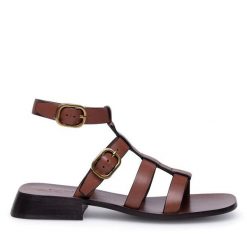 Sandały GINO ROSSI. Brązowe sandały damskie Gino Rossi, bez wzorów, bez obcasa, na płaskiej podeszwie, bez zapięcia. Za 269.99 zł.