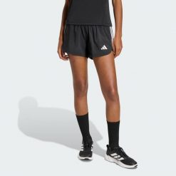 Szorty Pacer Workout Woven 2in1. Białe obuwie sportowe damskie Adidas, bez zapięcia, na fitness i siłownię. Za 179.00 zł.