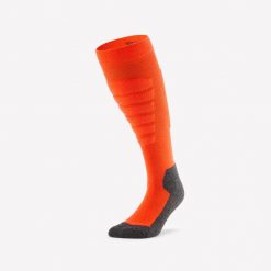 Skarpety narciarskie i snowboardowe dla dorosłych Wedze 100 Plus. Czerwone skarpetki damskie WED'ZE, bez wzorów, z elastanu. Za 39.99 zł.