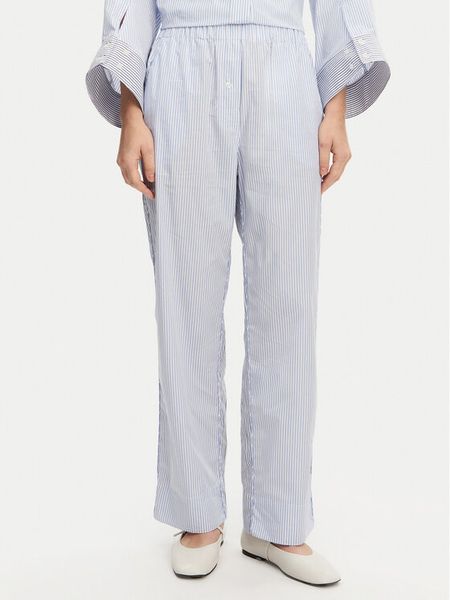 Munthe Spodnie materiałowe Fidda 251142725126 Błękitny Loose Fit. Niebieskie spodnie materiałowe damskie Munthe, bez wzorów, z bawełny. Za 489.99 zł.