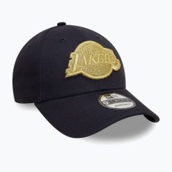 Czapka z daszkiem New Era Metallic 9Forty Los Angeles Lakers. Niebieskie czapki z daszkiem damskie New Era, bez wzorów. Za 119.99 zł.