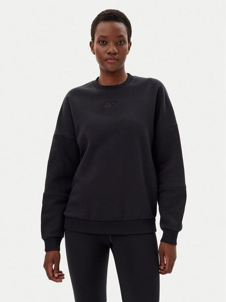 Reebok Bluza 100075359 139-18-00 Czarny Oversize. Czarne bluzy damskie Reebok, m, bez wzorów, z bawełny, bez kaptura. Za 146.99 zł.