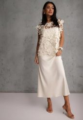 Jasnobeżowa Bawełniano-Wiskozowa Sukienka Slip Dress z Ozdobną Narzutką Sagossia. Brązowe sukienki damskie Renee, z aplikacjami, z bawełny, bez ramiączek. Za 249.99 zł.