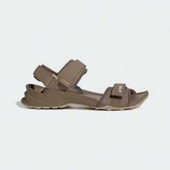 Sandały Terrex Hydroterra. Brązowe sandały damskie Adidas, bez wzorów, z gumy, bez obcasa, bez zapięcia. Za 277.60 zł.