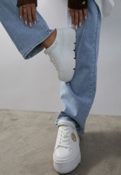Białe Sneakersy Vices na Platformie z Tłoczeniem Paskiem na Pięcie i Metaliczną Aplikacją Selfedi. Białe obuwie sportowe damskie Renee, z jeansu, bez zapięcia. Za 139.99 zł.