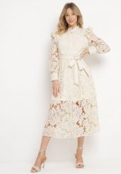 Beżowa Koronkowa Sukienka z Paskiem w Talii i Falbanką Nicasta. Brązowe sukienki damskie Born2be, bez wzorów, z koronki, eleganckie, bez ramiączek. W wyprzedaży za 229.49 zł.