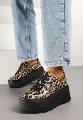 Panterkowe Sneakersy Vices na Grubej Podeszwie z Metaliczną Ozdobą Tatorelis. Obuwie sportowe casual damskie Born2be, z jeansu. Za 129.99 zł.