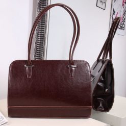 Torebka skórzana kuferek DAN-A T302 koniak. Kuferki damskie DAN-A, ze skóry, bez dodatków. Za 349.99 zł.