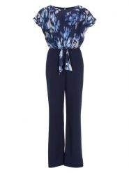 SWING Kombinezon w kolorze granatowym rozmiar: 36. Niebieskie kombinezony damskie Swing, bez wzorów, bez kołnierzyka, bez ramiączek. Za 304.95 zł.