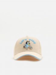 Czapka z daszkiem Bluey - kremowy. Białe szorty damskie Reserved, bez wzorów, z bawełny. Za 39.99 zł.