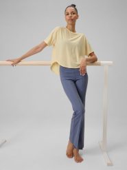 4F Koszulka do jogi regular szybkoschnąca damska - żółta L. Żółte koszulki sportowe damskie 4F, l, bez wzorów, z dzianiny, bez ramiączek, na jogę i pilates. Za 129.99 zł.