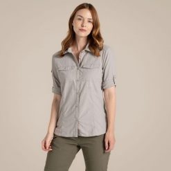 Koszula damska Craghoppers NosiLife Adventure Long Sleeved Shirt III. Brązowe koszule damskie Craghoppers, bez wzorów, casualowe, bez kołnierzyka, bez ramiączek. Za 429.99 zł.