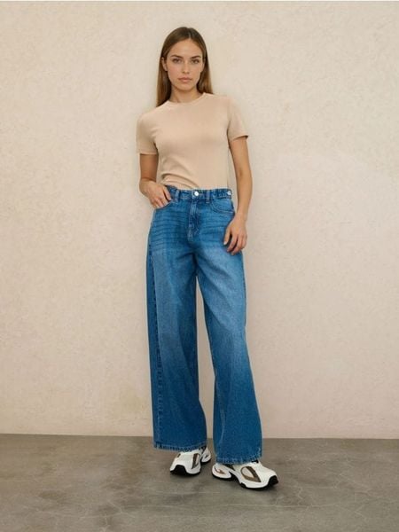 Jeansy baggy mid waist - niebieski. Niebieskie jeansy damskie Sinsay. W wyprzedaży za 55.99 zł.