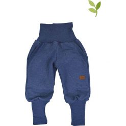 Spodnie "Jogger" w kolorze granatowym. Niebieskie spodnie niemowlęce LiVi, z materiału. W wyprzedaży za 125.95 zł.