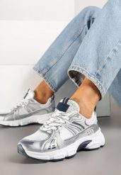 Biało-Srebrne Sneakersy w Streetwearowym Stylu z Siateczkowymi Zdobieniami Dorelline. Białe obuwie sportowe damskie Born2be, z jeansu, bez zapięcia. Za 99.99 zł.